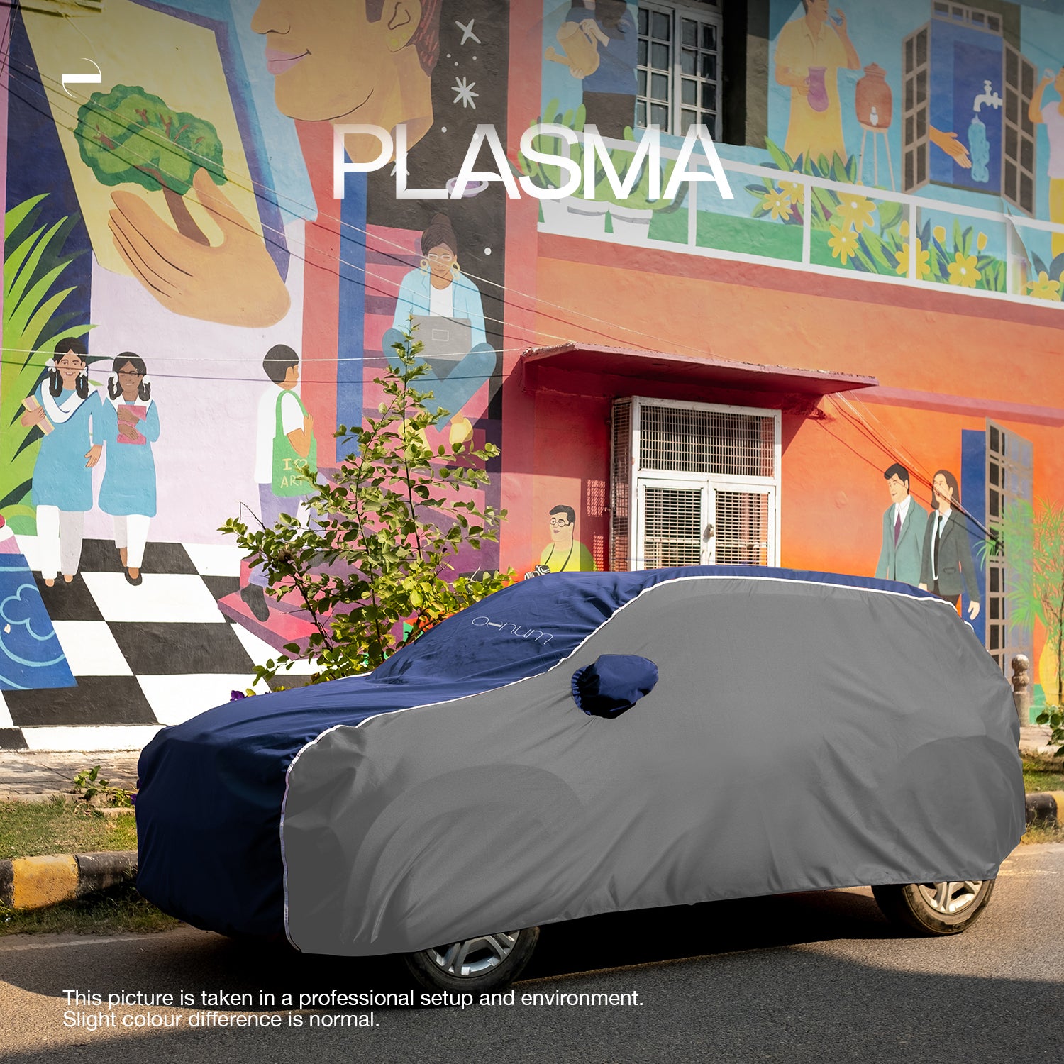 Side Lifestyle shot of Oenum plasma blue grey custom fit car cover on a car parked on society's surrounding street with colorful mural backdrop