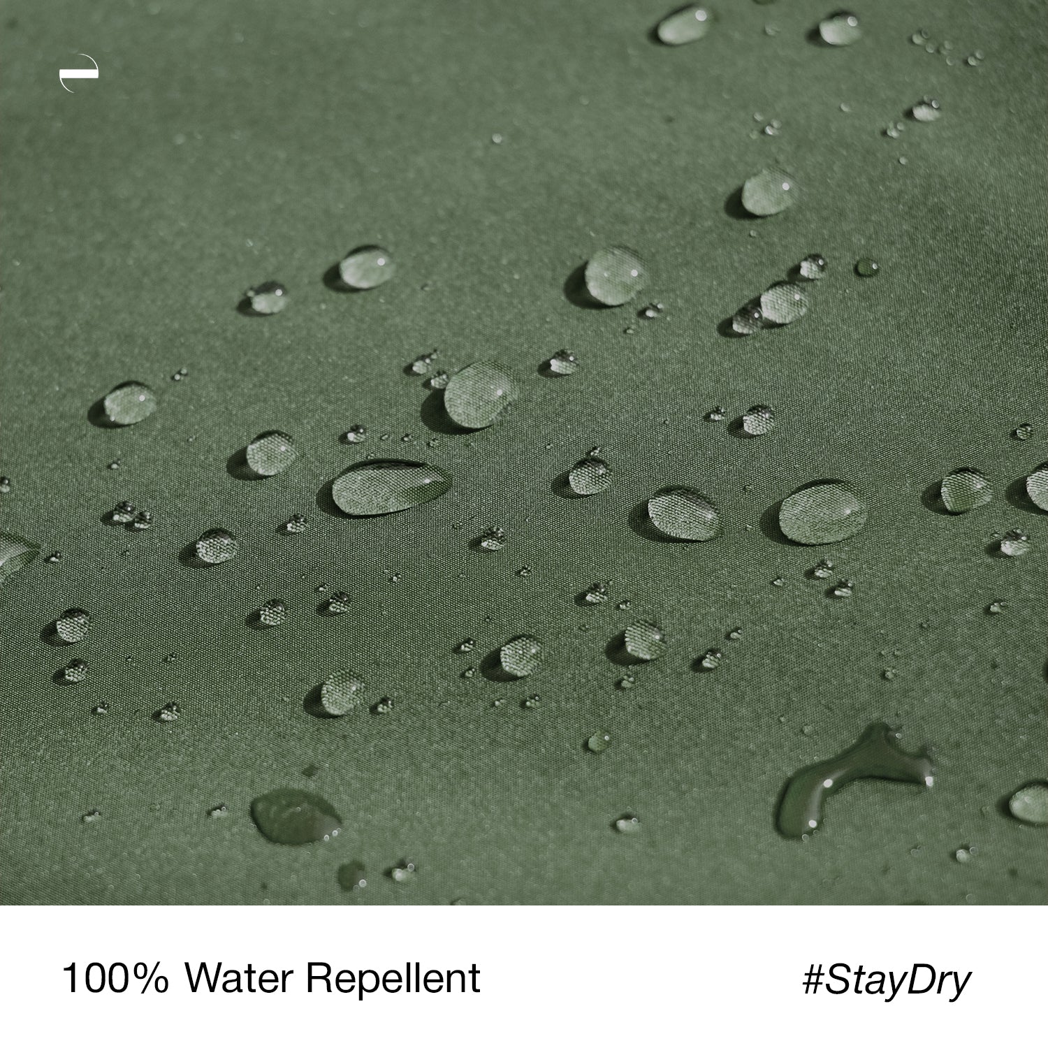 Close-up macro photo of the OENUM Plasma car cover's green fabric surface, showing dozens of intact water droplets beading on top without soaking into the weave, demonstrating water-repellent performance; caption below reads '100% Water Repellent #StayDry.'